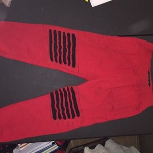 Switch Remarkable red distressed joggers.